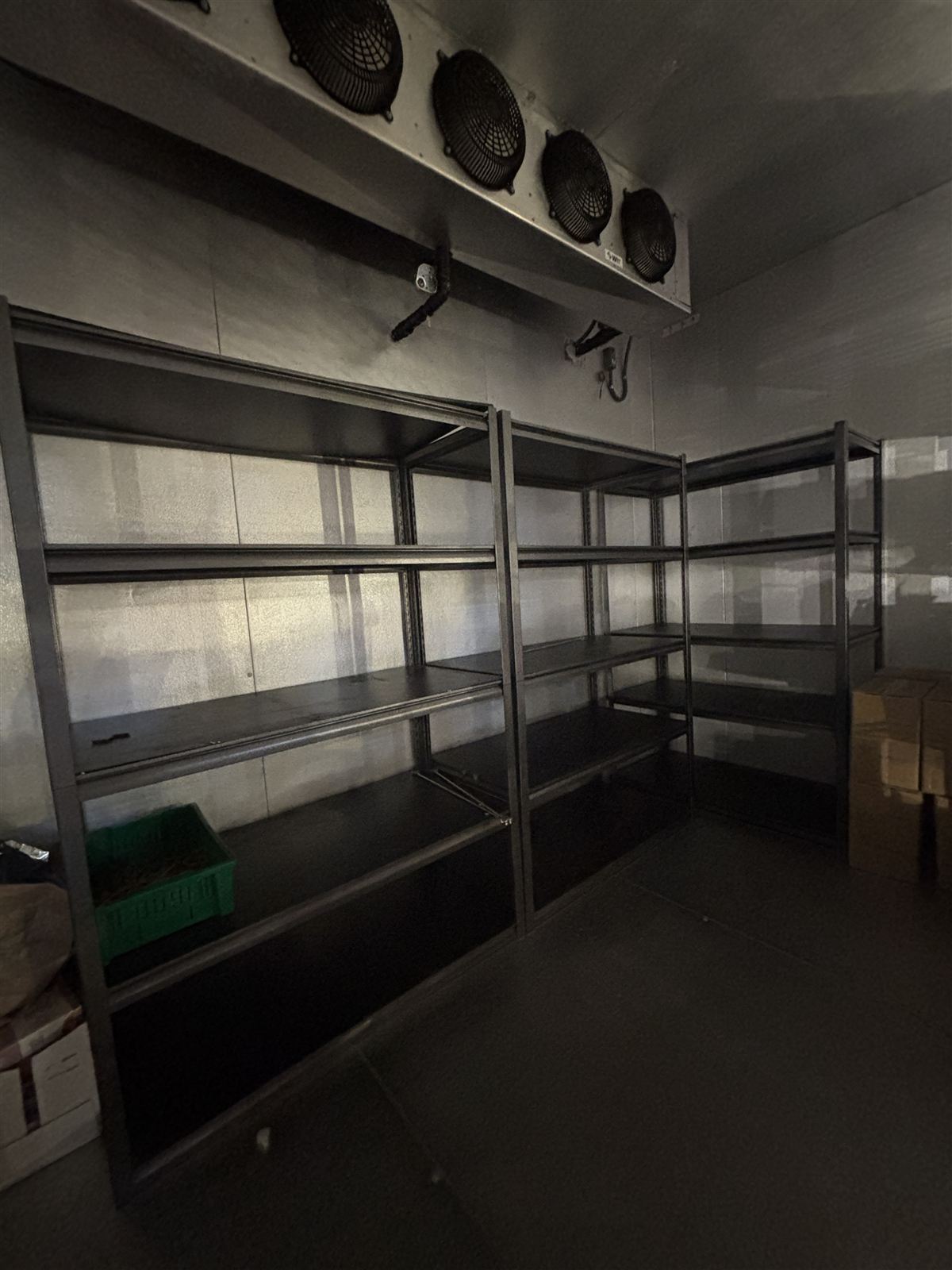 Walk-in freezer interior with cooling system